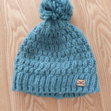 Cappellino in maglia Nordbron con pon-pon