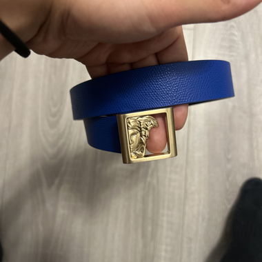 Blue belt with golden buckle