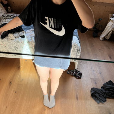 black Nike shirt