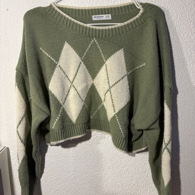 Grüner Strickpullover mit Argyle-Muster
