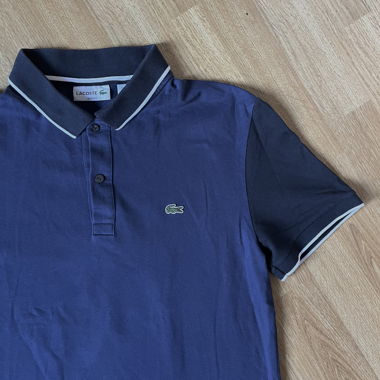 Polo Lacoste bleu foncé