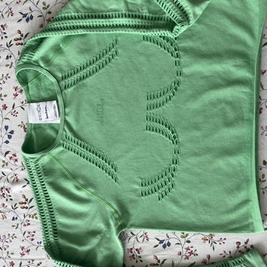 Fluorescent top with holes