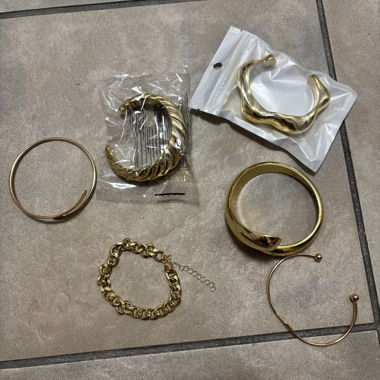 Set di bracciali a fascia dorati