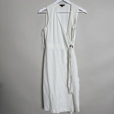 White sleeveless wrap dress