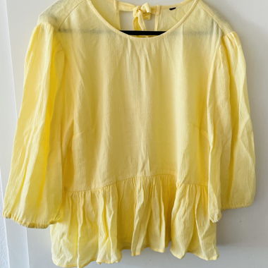 Yellow blouse/shirt with bows on the back