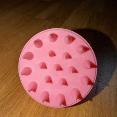 Pinke Kopfhautmassagebuerste