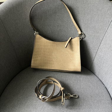 Shiny crocodile handbag
