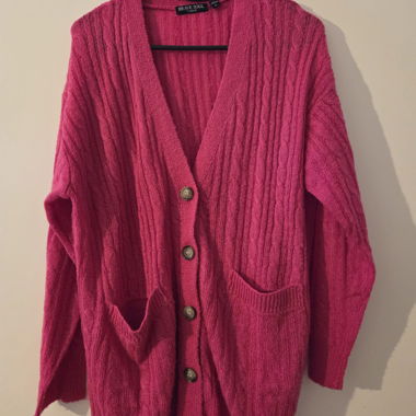 Pinke Strickjacke