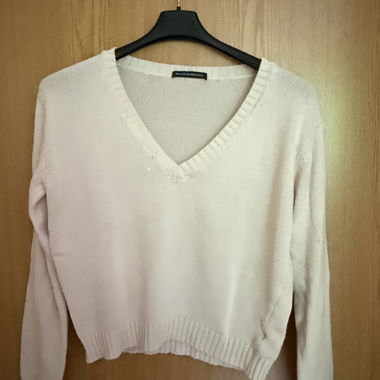 White V-neck sweater