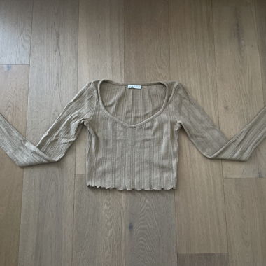 Top beige a maniche lunghe 
