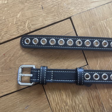 Black studded belt with eyelets