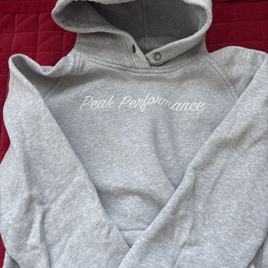 Felpa con cappuccio grigia Peak Performance