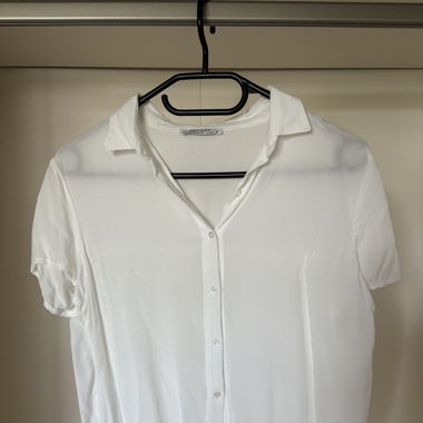 Blusa a maniche corte con colletto