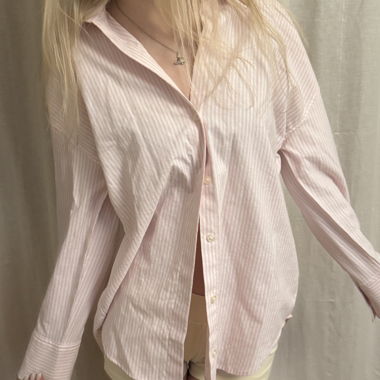 Camicia abbottonata a righe rosa