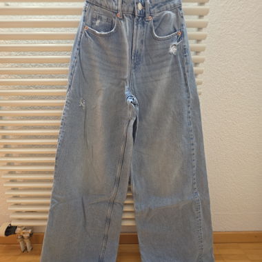 Jeans a gamba larga a vita bassa