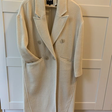 Cappotto oversize elegante color crema