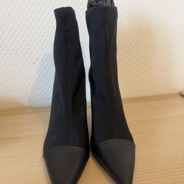 Black pointed sock ankle boots