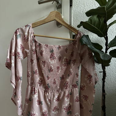 Pink romper with flowy arms