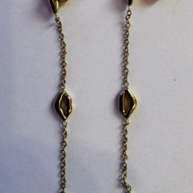 Boucles d'oreilles pendantes dorées avec bouche