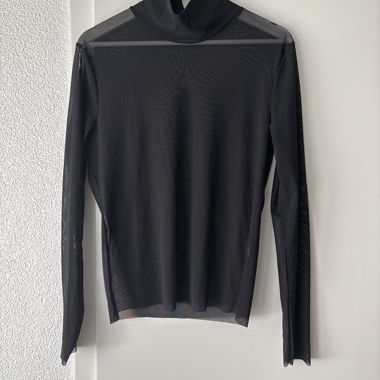 Haut noir élégant et transparent