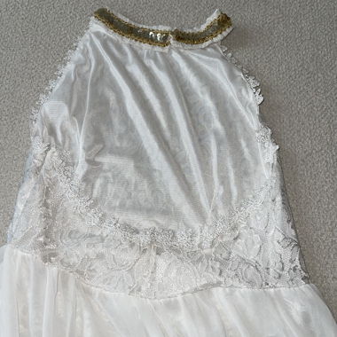 White lace maxi dress with gold neckline