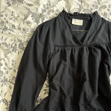 Navy blouse with embroidery details