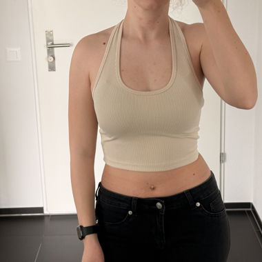 Top corto a canotta con scollo a halter a coste