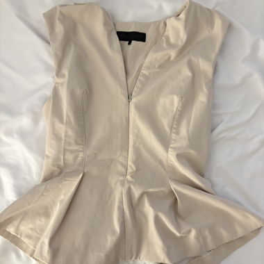 Zara ärmellose Peplum-Top