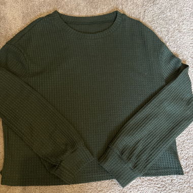 Pull vert foncé structuré