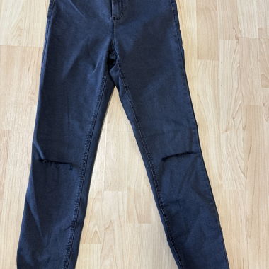Jeans skinny a vita alta con cut-out