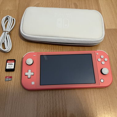 Switch Lite avec un jeux et accessoires 