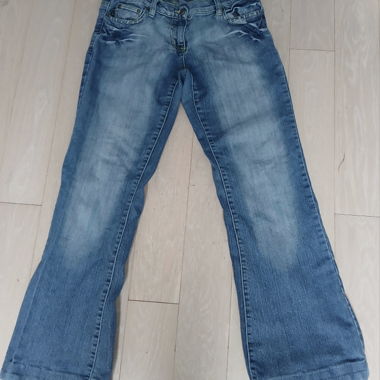 Jeans a vita bassa slavati