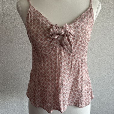 Top a spalline rosa con fiocco