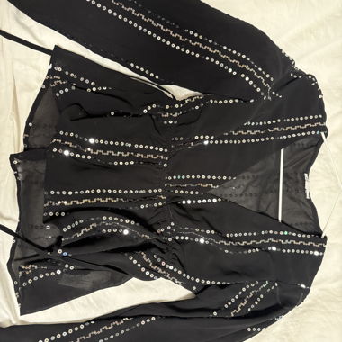 Top con paillettes nero