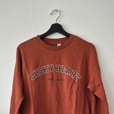 Pull marron inscription 