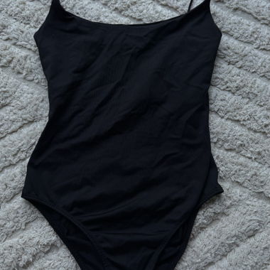 Black spaghetti-strap bodysuit