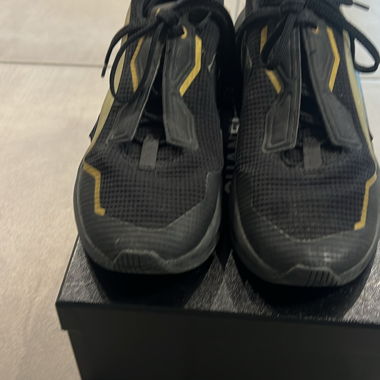 Scarpe sportive Puma nere e oro