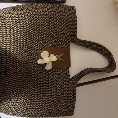 Woven handbag with logo