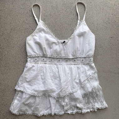 Asymmetrical lace ruffles & beads babydoll top