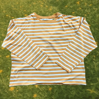 Maglione a righe arancione e bianco