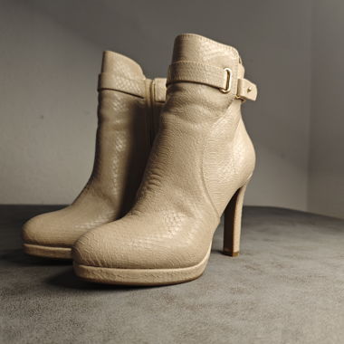 Beige heeled ankle boots