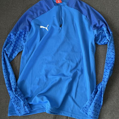 Top sportivo Puma blu a maniche lunghe
