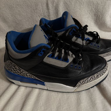 Black, blue and white high-top sneakers