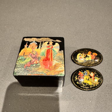 Small box with two brooches