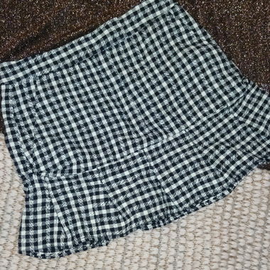Pleated caro miniskirt