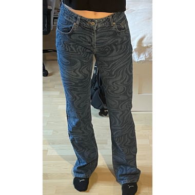 Jeans bleu avec motifs