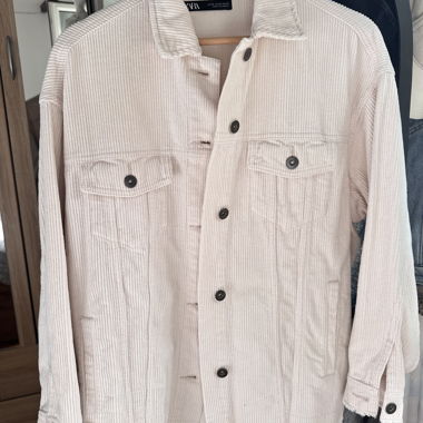 ZARA corduroy jacket in light beige.