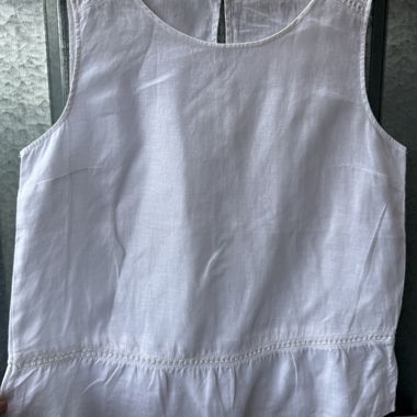 White sleeveless linen top