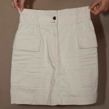 Gonna beige con tasche