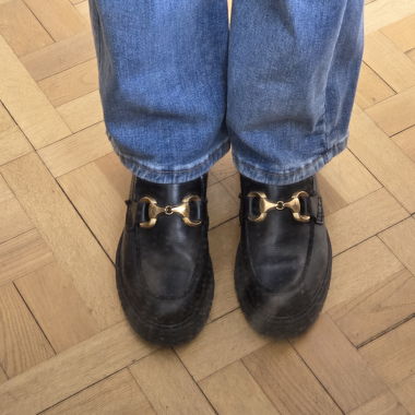 Black loafers with clip